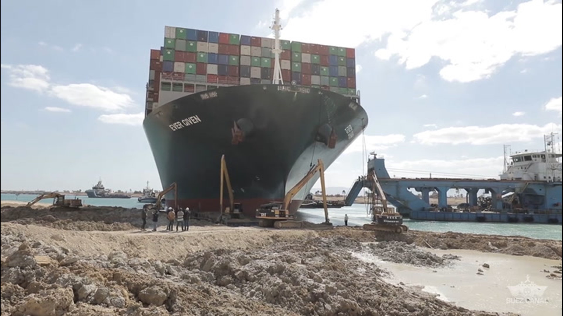 Footage released by the Suez Canal Authority on Sunday showed increased dredging and drilling around the Ever Given, as crews worked to deepen the canal directly around the ship in order to get it floating.