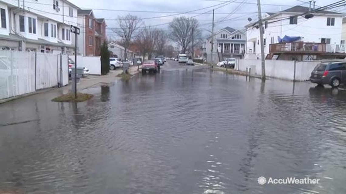 Water sits in streets for days following flooding downpours
