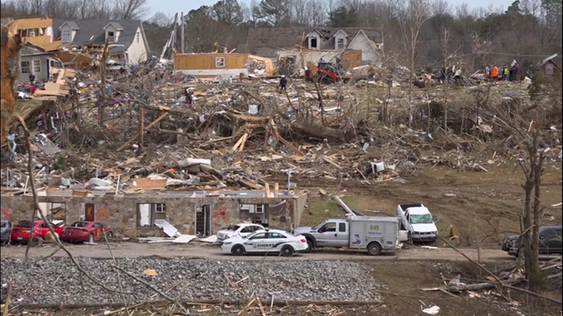 Family members spent March 4 digging through rubble and looking for keepsakes to remember a couple killed by a tornado in Putnam County, Tennessee.