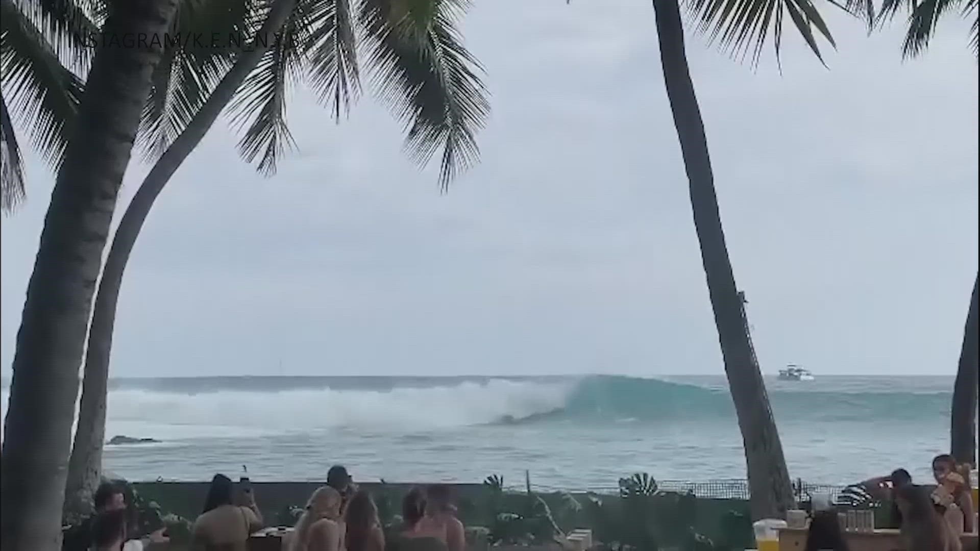 Towering waves on Hawaii's south shores crashed into homes and businesses, spilled across highways and toppled tables at a wedding reception. (Via AP)