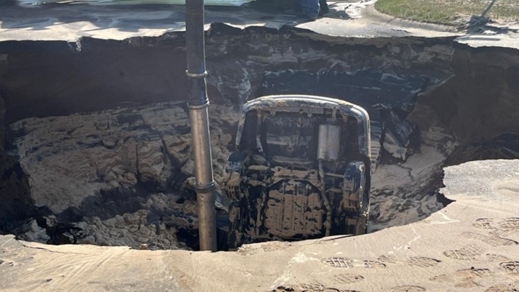 Woman escapes uninjured as sinkhole engulfs her car in Brooklyn Park