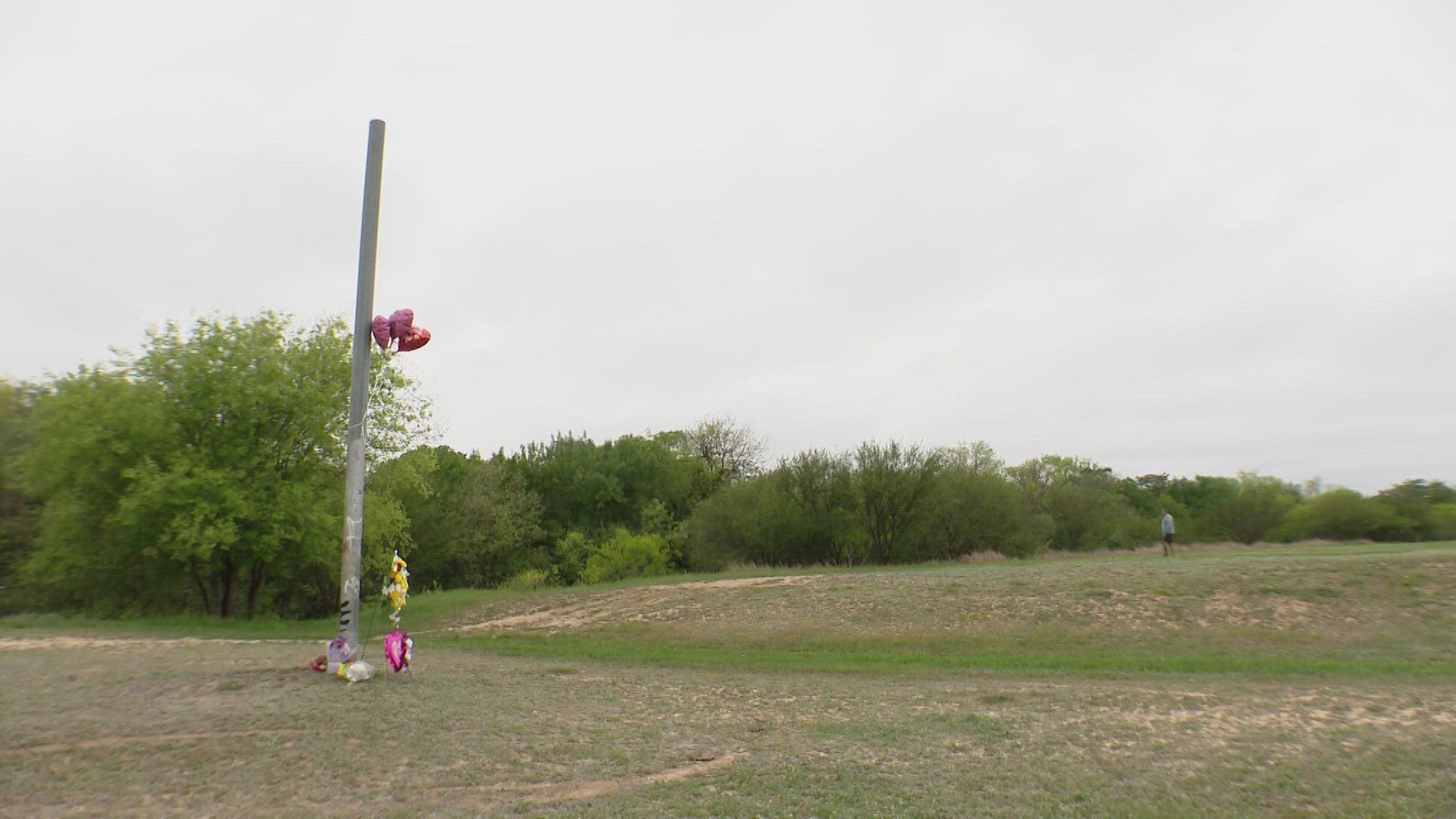 Flowers have been laid underneath a small memorial in Tom Slick Community Park. One bouquet reads 'RIP Kaiden, heavenly angel.'