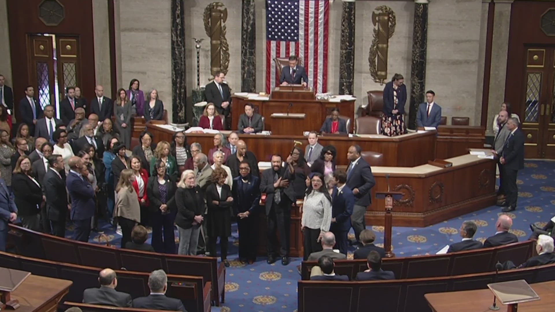 Rep. Al Green was joined by other Democrats who broke out in song, "We Shall Overcome." Ten Democrats joined Republicans in the vote.