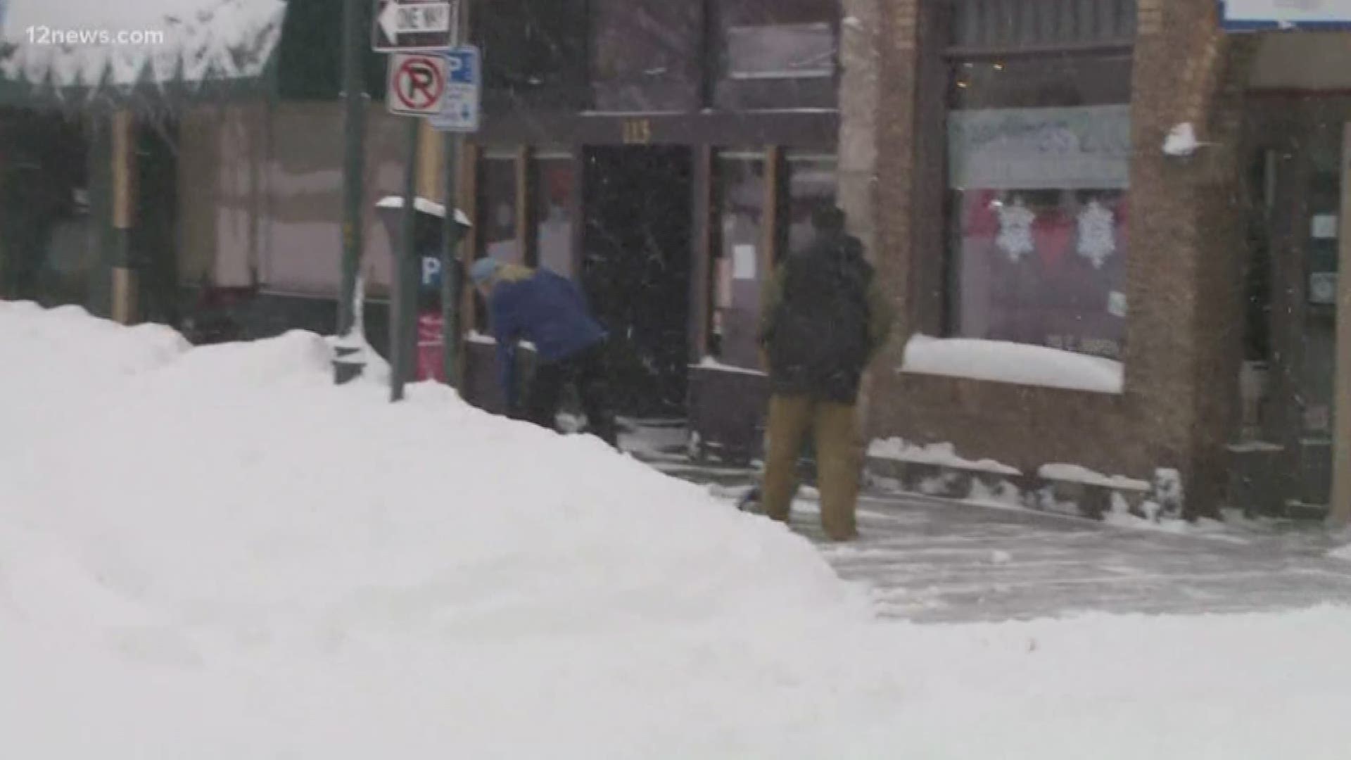 Flagstaff is getting hit with a record amount of snow, and it is keeping people indoors. Well, most people. We caught up with one guy who was walking around in a t-shirt.