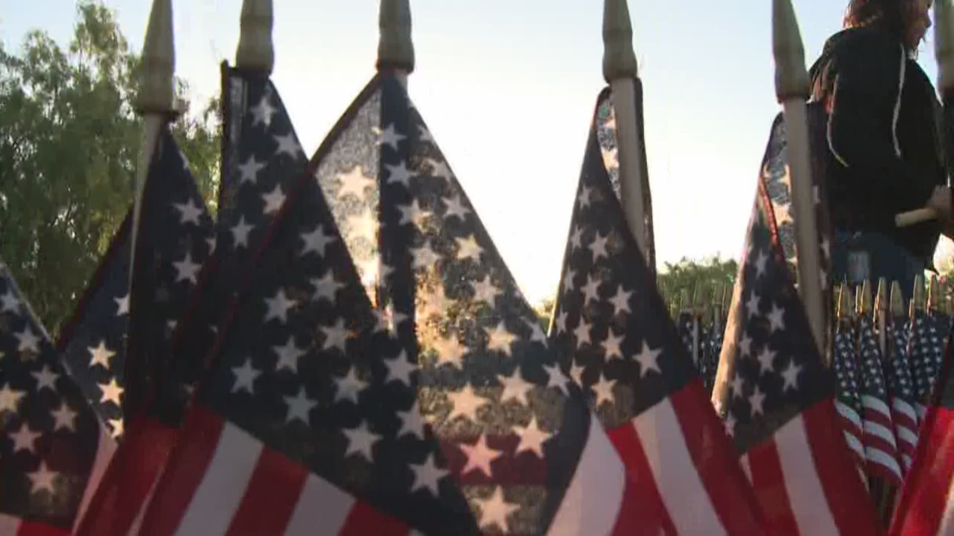 Volunteers from University of Phoenix have planted 10,000 American flags as a symbol of appreciation.