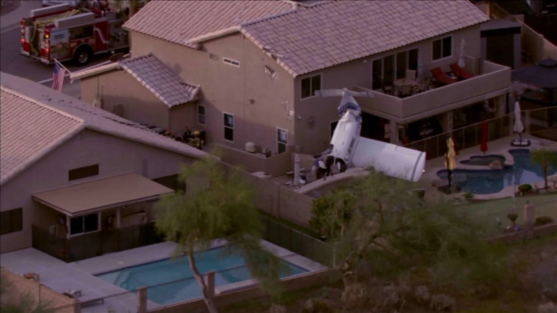 WATCH: Plane crashes into two Arizona homes, hurts 3