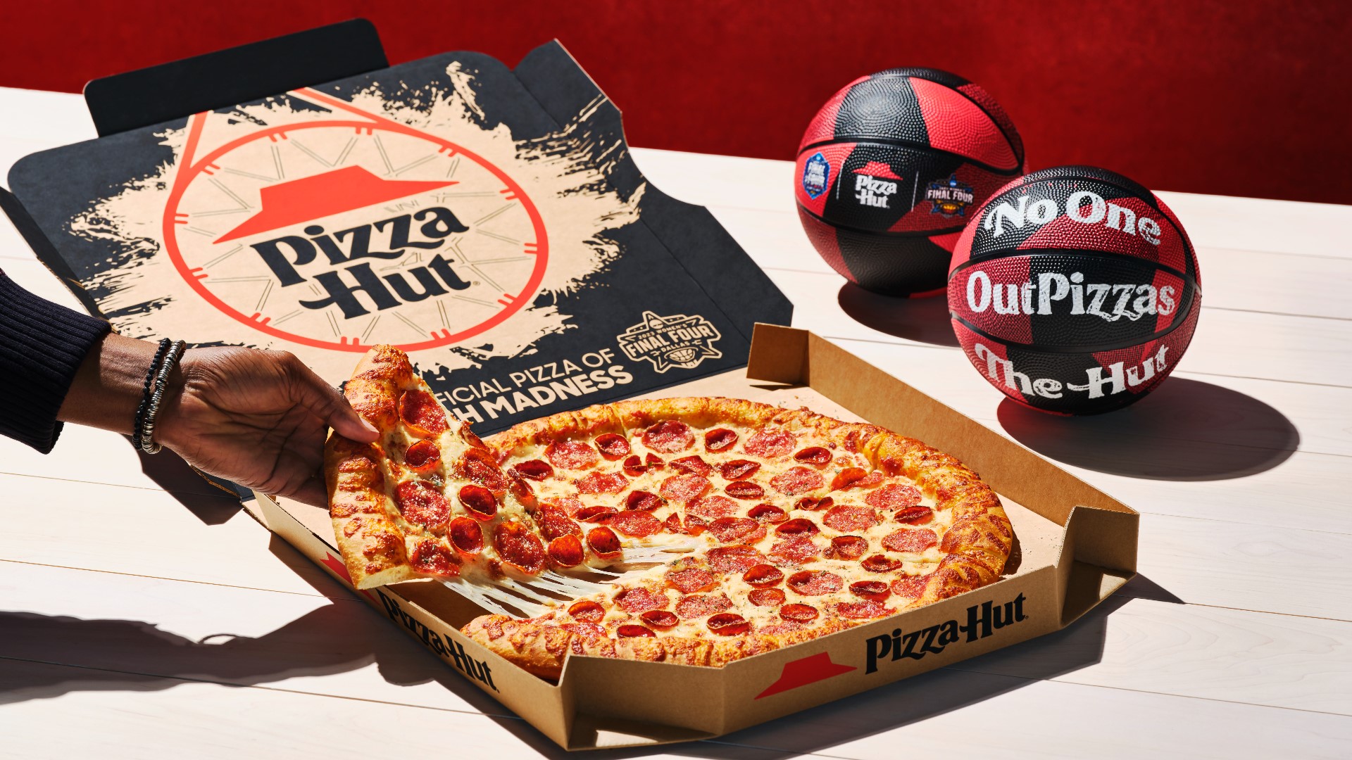 Get ready to feel nostalgic, millennials. Pizza Hut is preparing for March Madness with a '90s favorite.