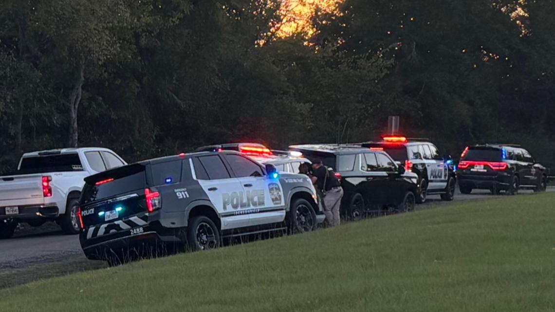 Texas officer and K-9 shot in manhunt for armed suspect Bobby Michael Dennis