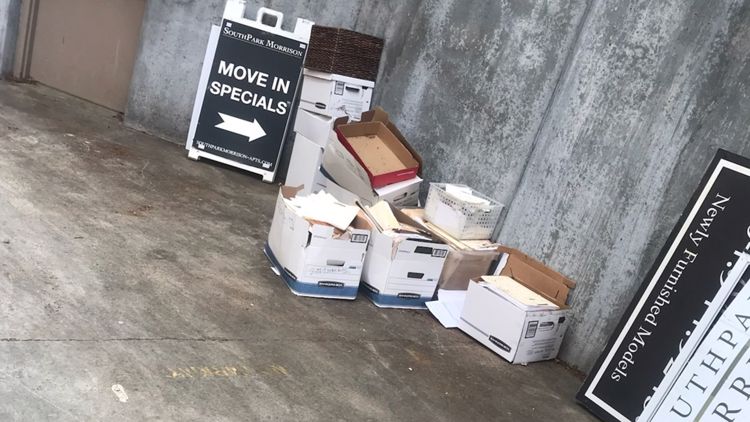 Folders containing people's private information dumped in trash area of North Carolina apartment complex