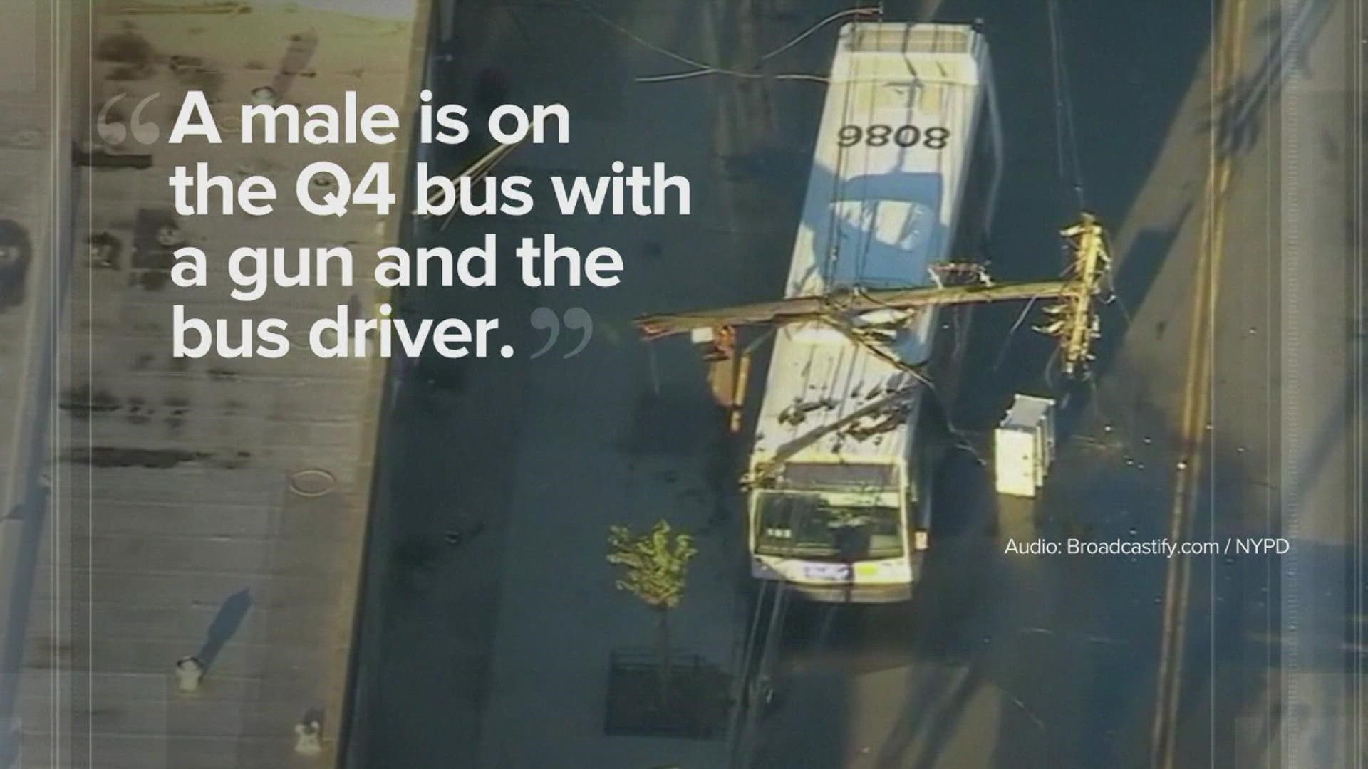 The bus driver allowed passengers to escape during the incident.