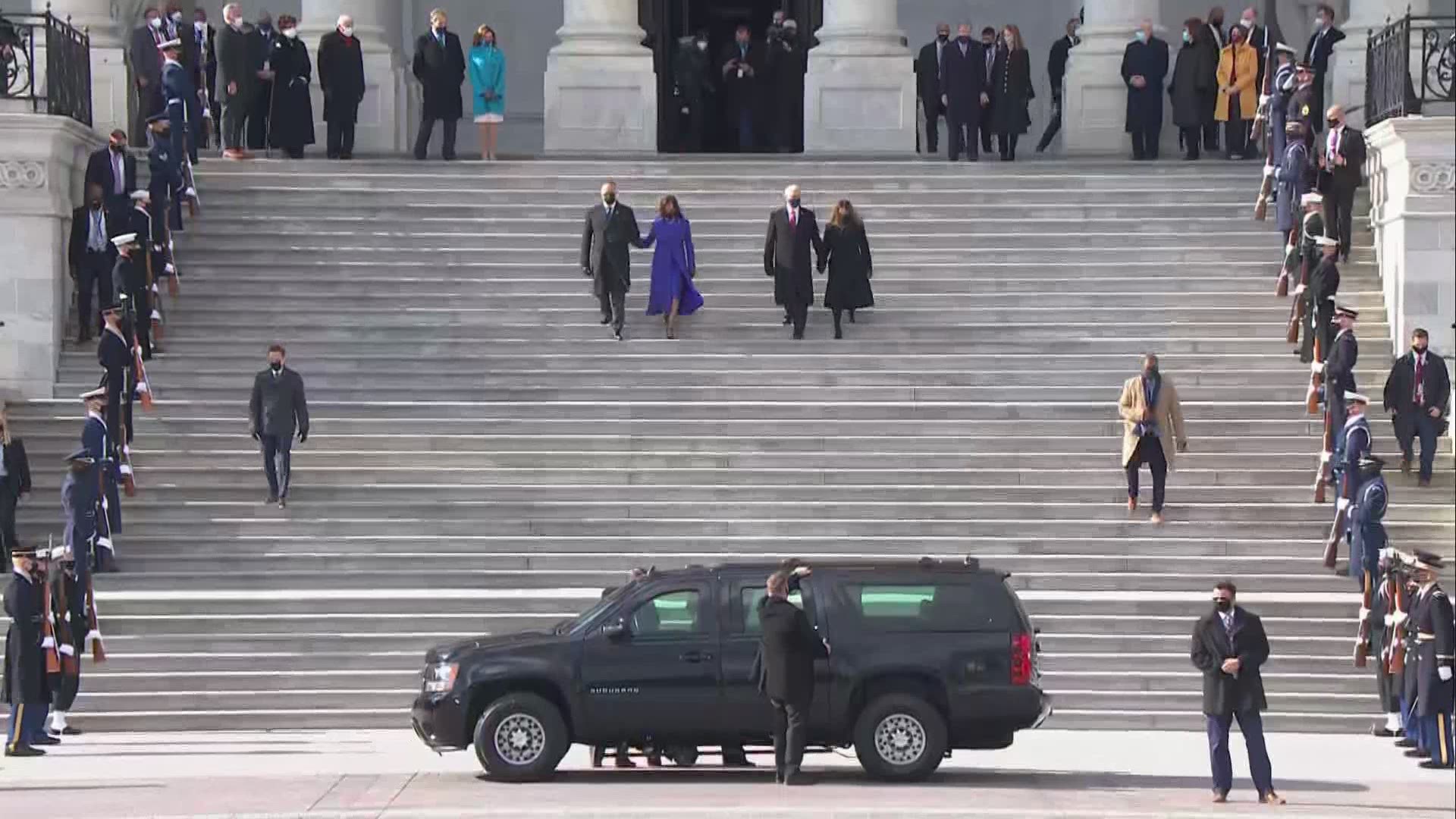 Mike and Karen Pence exit the inauguration of Joe Biden and Kamala Harris.