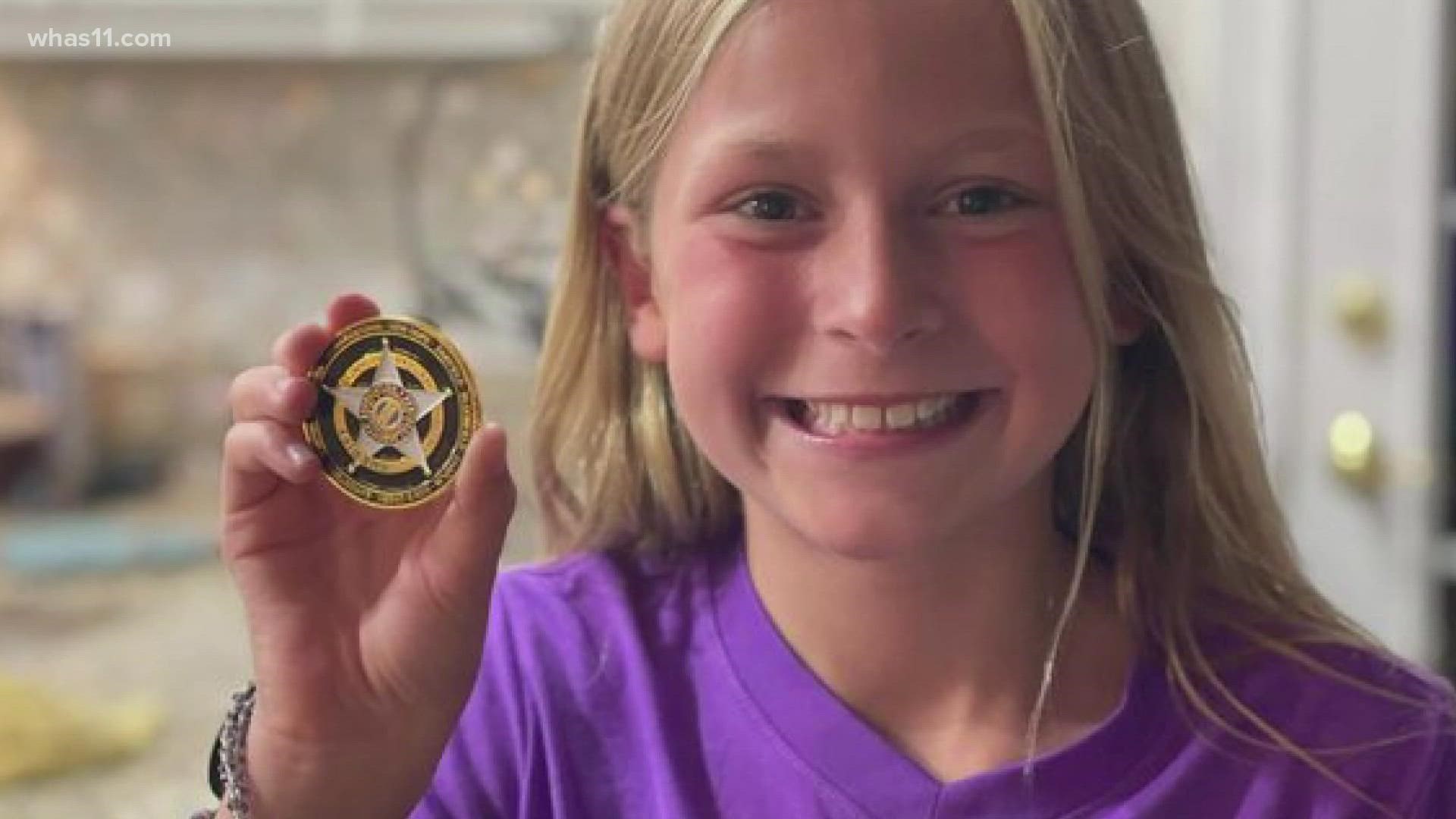 The Nelson County Sheriff was so impressed with Laken's bravery, he gave her the Sheriff's Office Challenge coin.