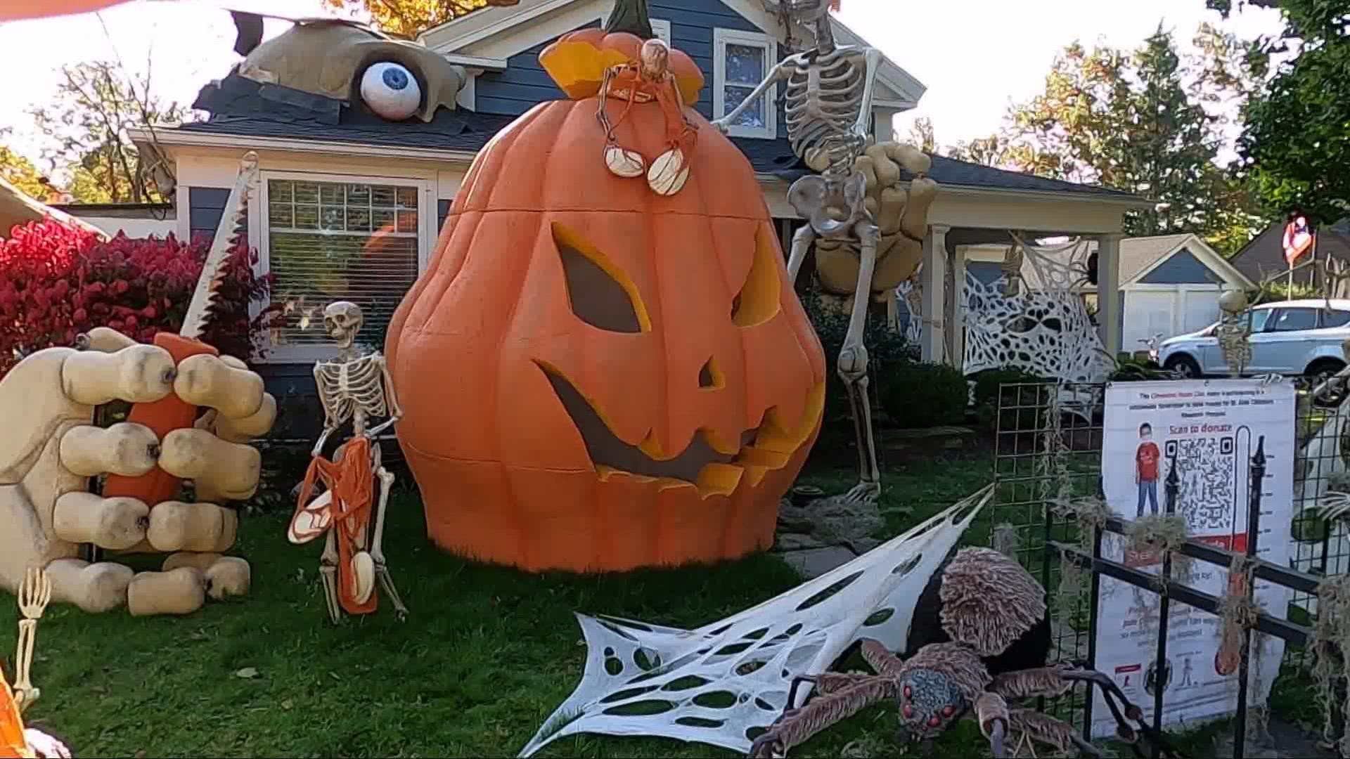 His epic Halloween display in Olmsted Falls is even bigger this year as he created a massive pumpkin to go with his giant skeleton.