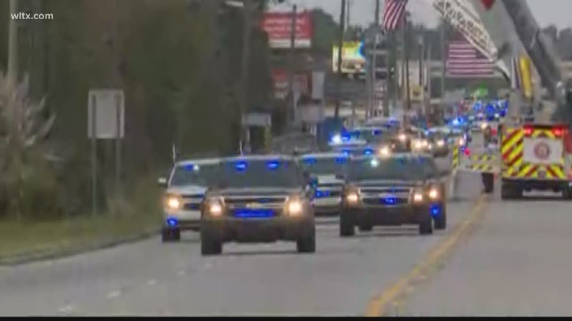 Florence county deputy Farrah Turner dies of wounds sustained in a shooting about 3 weeks ago.  Here the community watches as her body comes through Lake City