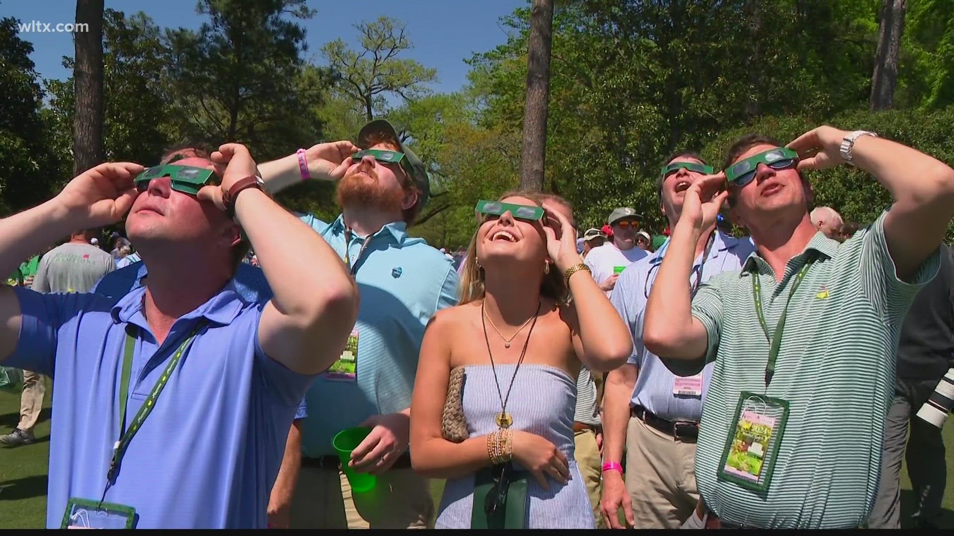 The first day of Masters week saw patrons take their eyes off their course and focus on the sky as the 2024 eclipse moved across the state