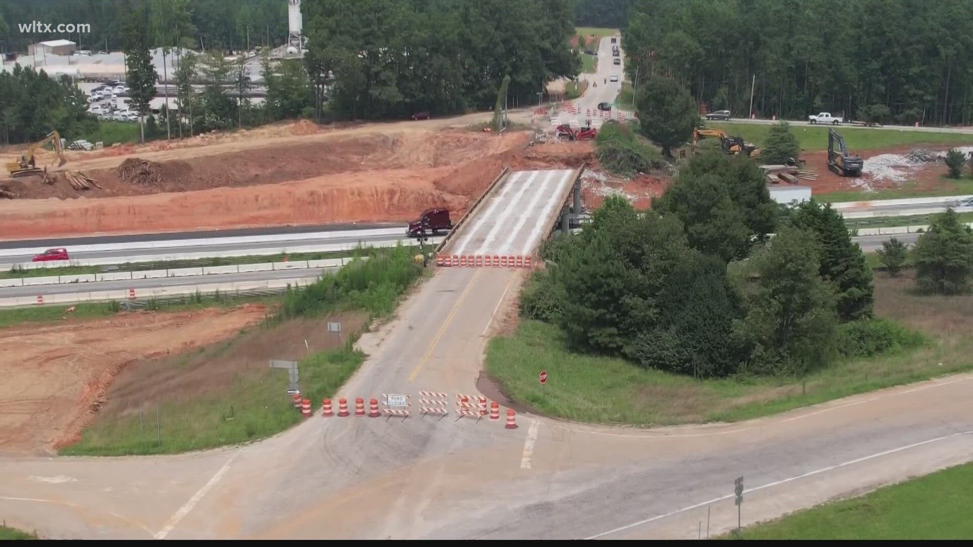 Exit 91's new bridge is finished and road widening and paving of the overpass is still underway. 
They say exit 97's bridge is partially open