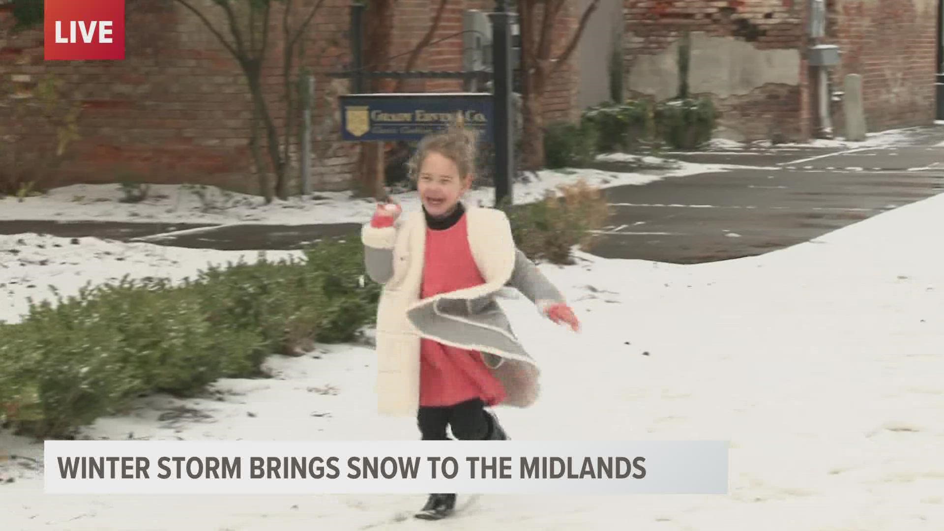 For one little girl, the snow was a chance to have a snowball fight with her dad.