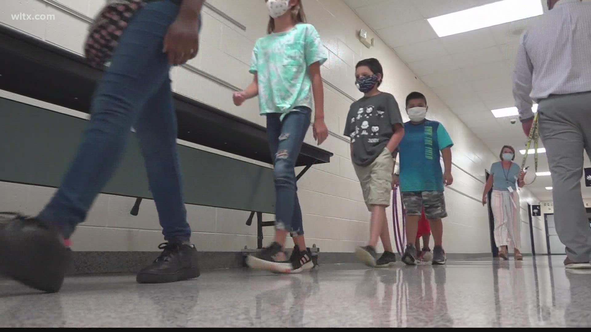 While masks and vaccinations can't be mandated in South Carolina, DHEC and the state school superintendent are urging both among students, staff and others.
