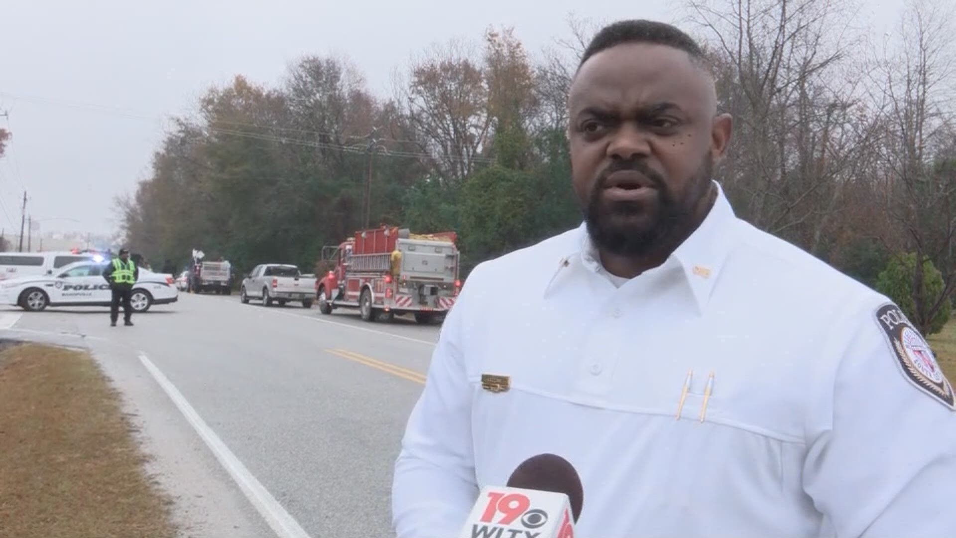 Bishopville police chief Calvin Collins describes the scene in Bishopville as crews respond to an incident outside the Coca Cola plant.