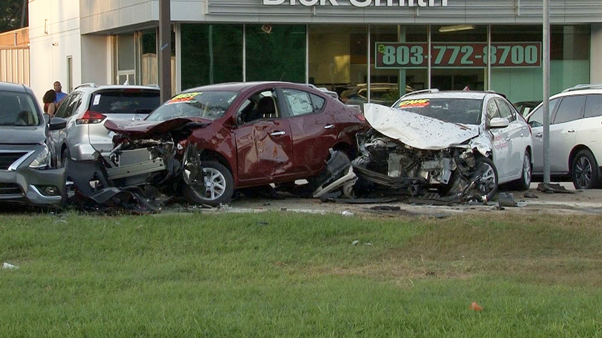 A car ran off the road and crashed into a Columbia car dealership, damaging several vehicles in the process.