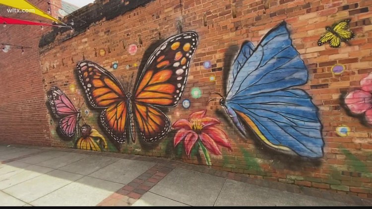 Artist creating murals all around Camden