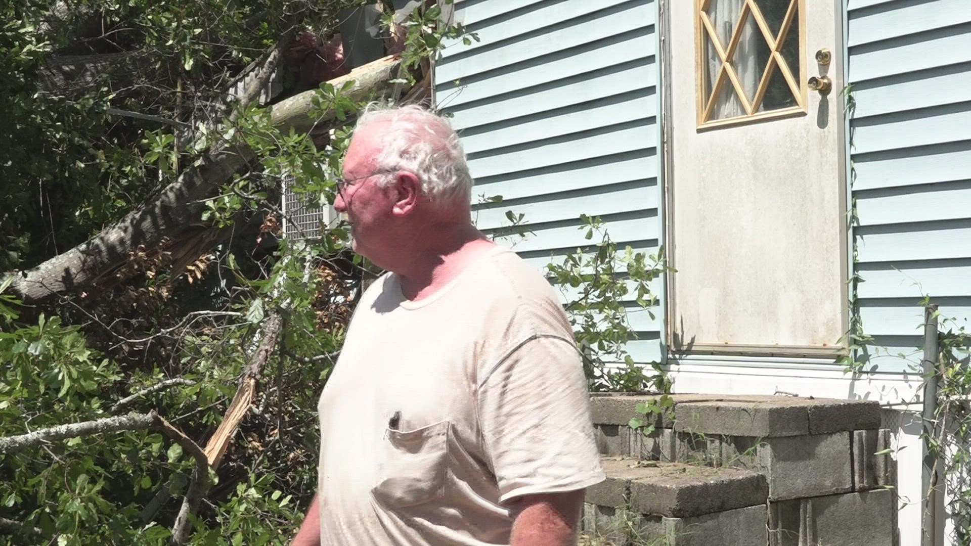 The gusty winds sent a tree crashing down destroying the home of Robert Schifflett and his wife.