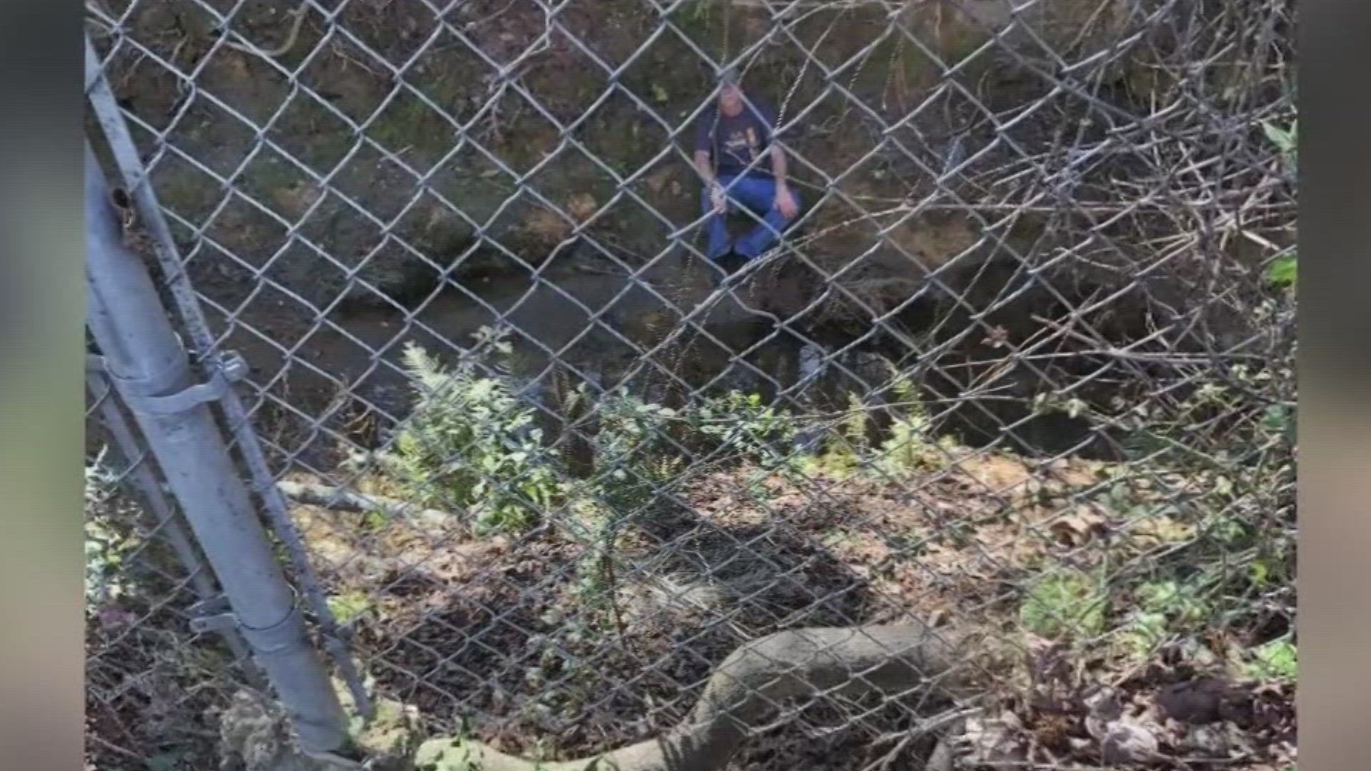 The 'canyon' was once a small stream that carried water from a drainage pipe, but now it's a deep ravine that residents say their yards are slowly falling into.