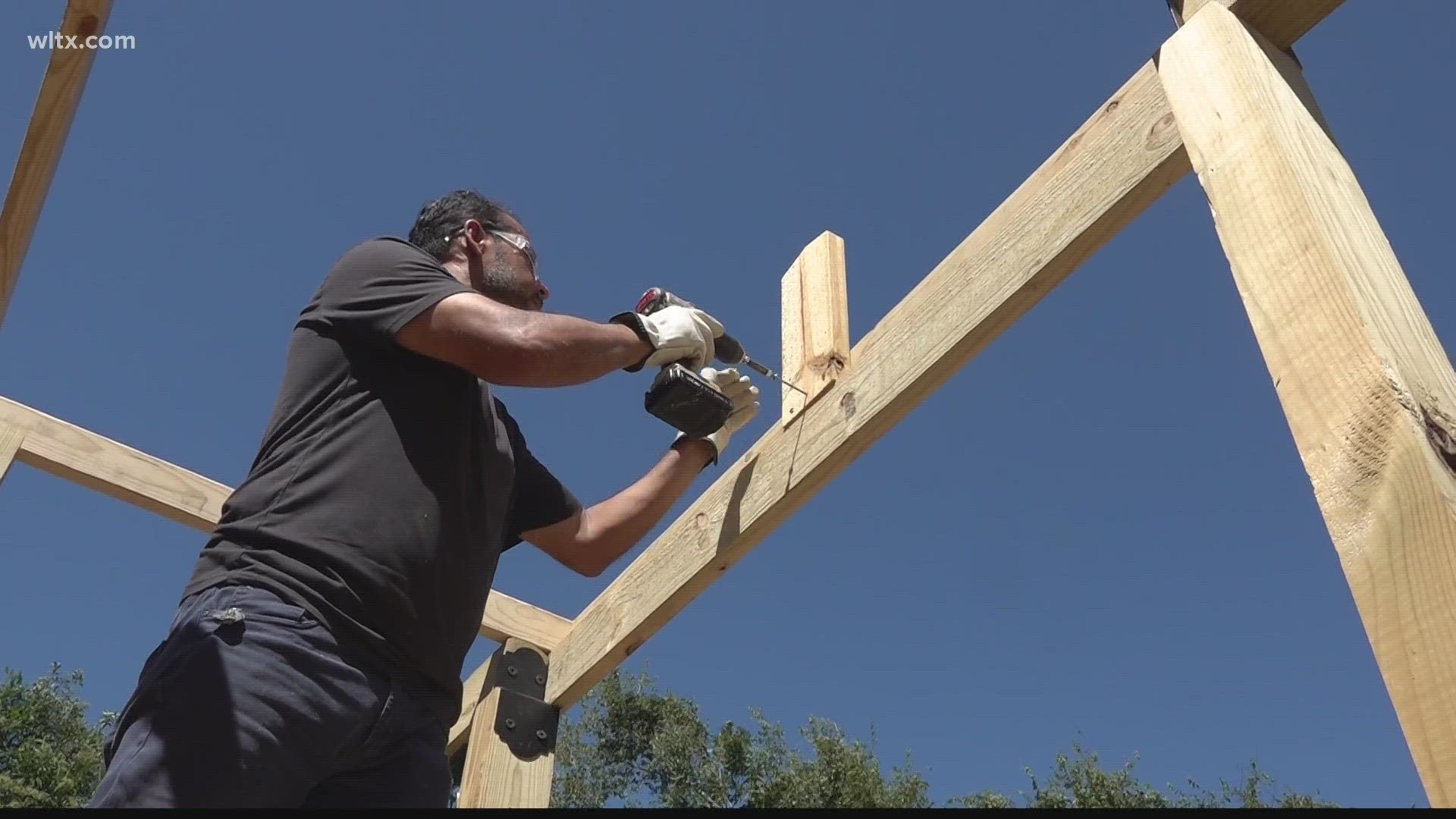 More than 100 volunteers picked up paintbrushes, rakes and more for United Way of Kershaw County's Day of Caring.'