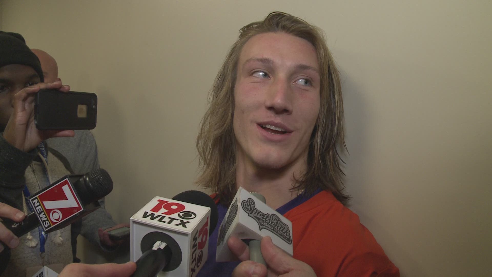 Trevor Lawrence speaks to the media following Clemson's 56-35 win over South Carolina.  Lawrence was 27-36-393-1-0.