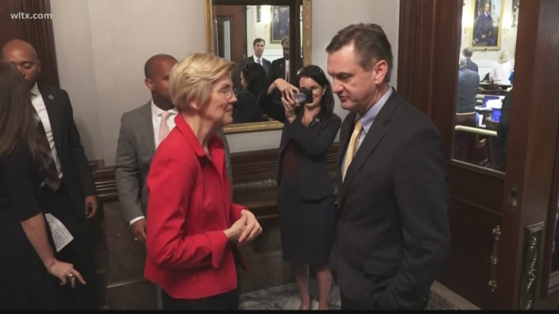 Democratic presidential hopeful Elizabeth Warren was at the state house today.
The Massachusetts senator spent a few minutes on the floor taking pictures and speaking with state lawmakers.