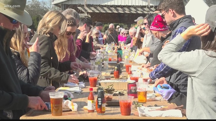 Annual Pig and Oyster Roast draws crows to Columbia