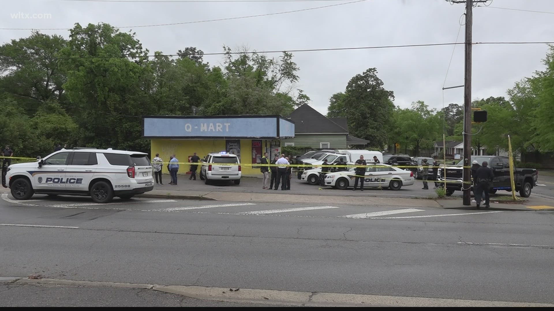 A woman was found dead in a garbage can behind the QMart in the 3200 block of Colonial Drive.