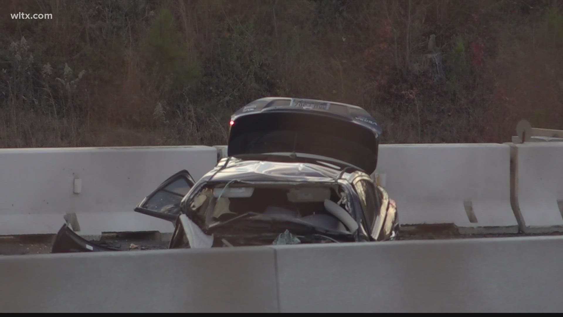Investigators say the driver was running from police when he crashed head-on into another driver on I-126.