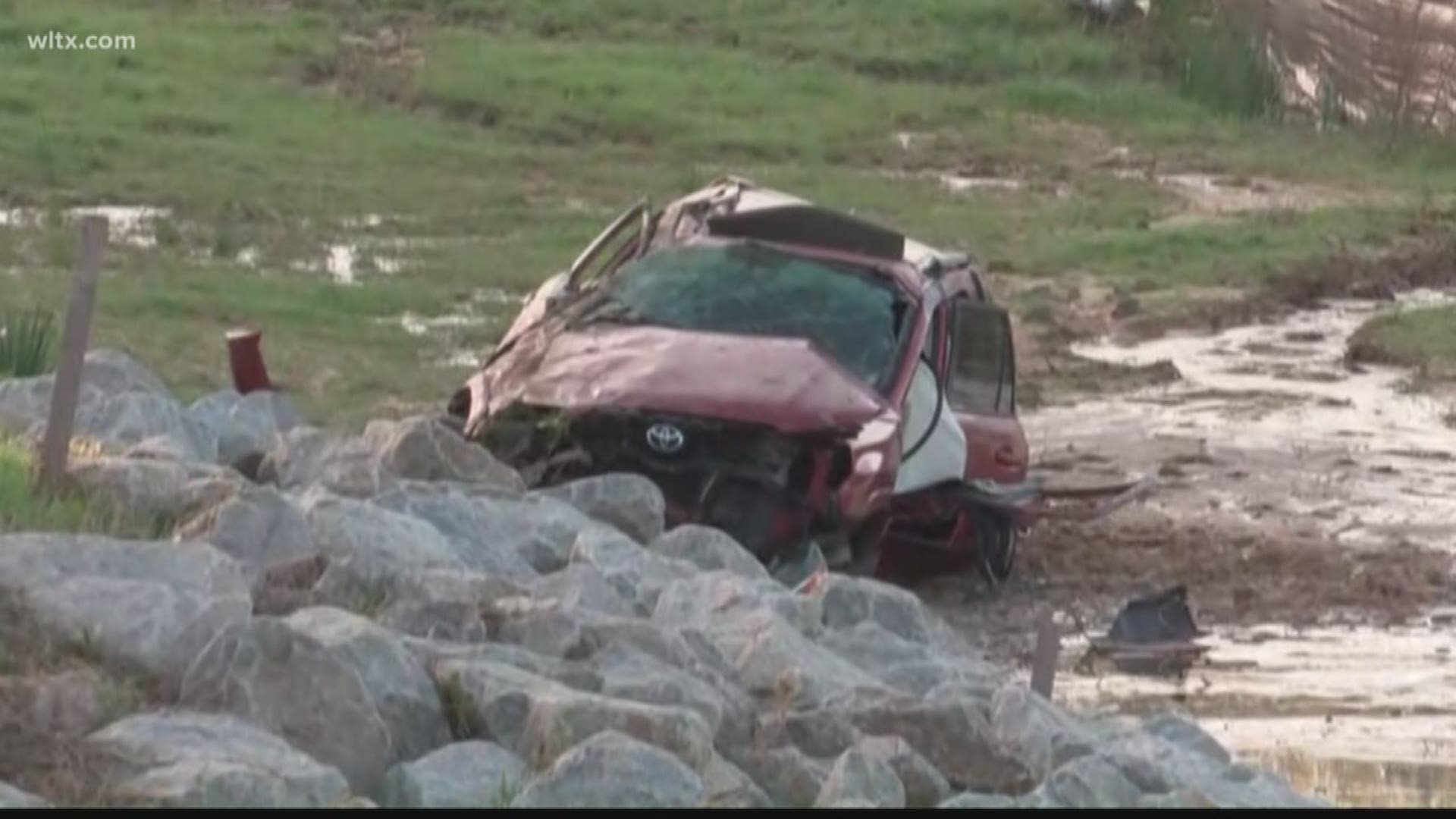 Highway Patrol says an adult and child were rescued from the vehicle after a collision involving a tractor trailer.