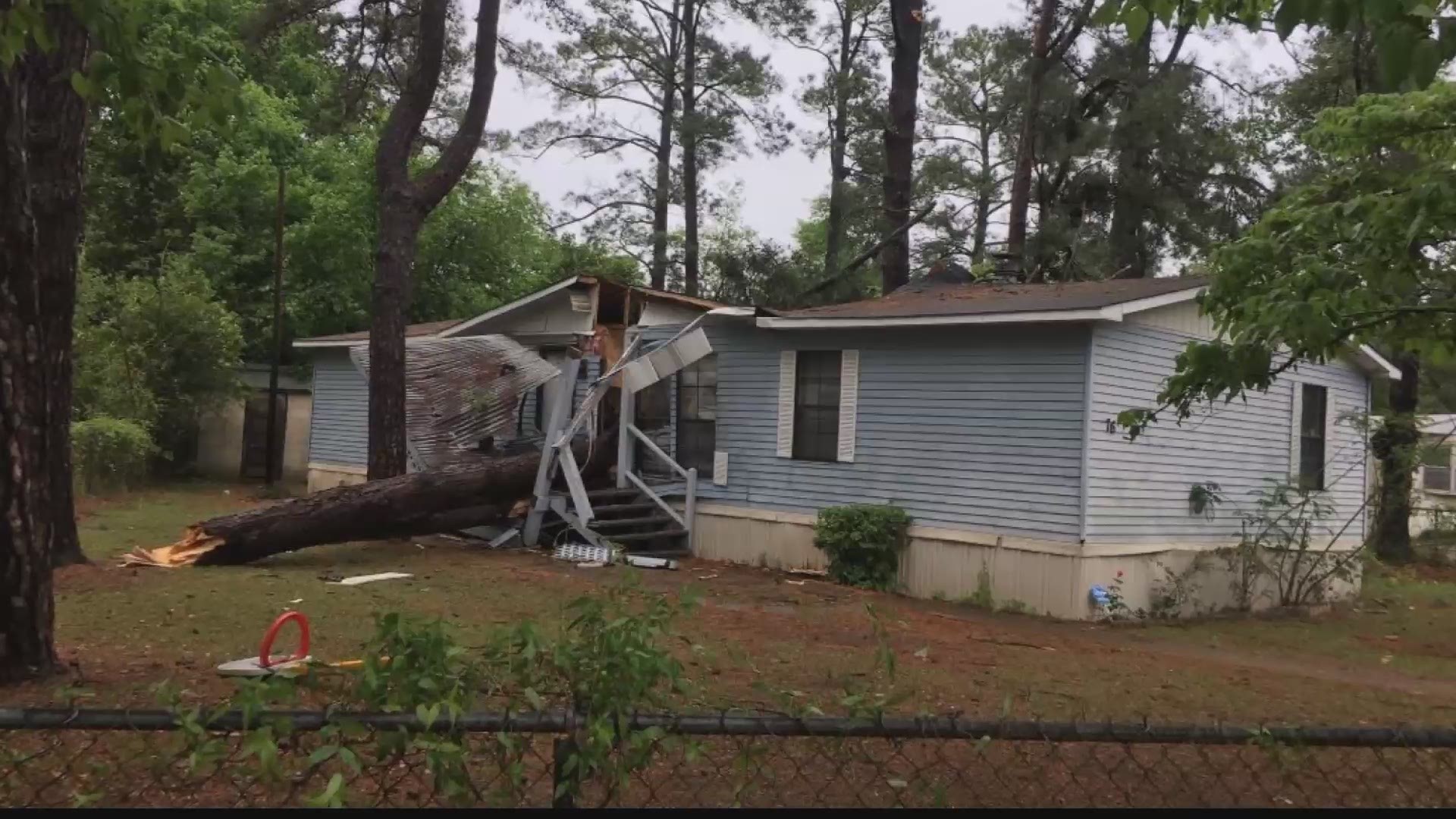 The little boy had to be taken to the hospital after high winds sent a tree crashing down on his home.