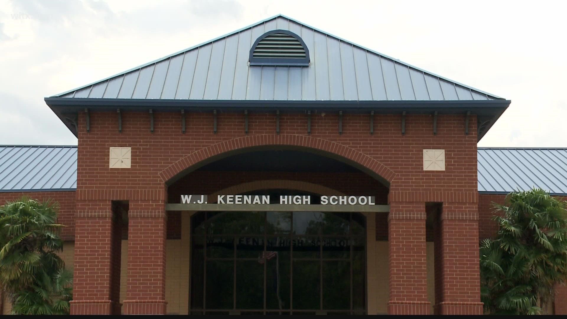 The 17-year-old male student has been charged with bringing a loaded gun to Keenan High School.