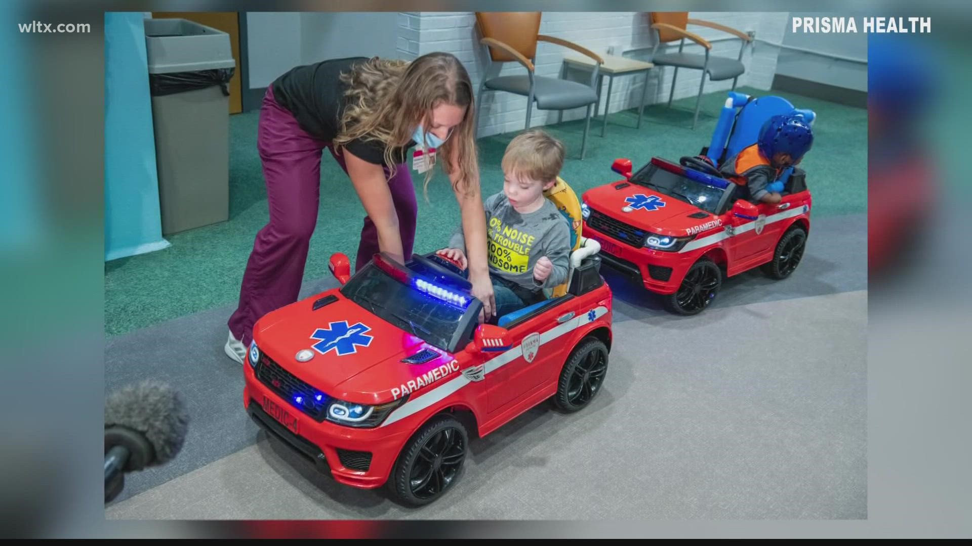 Prisma health employees donate toy cars to Columbia children 