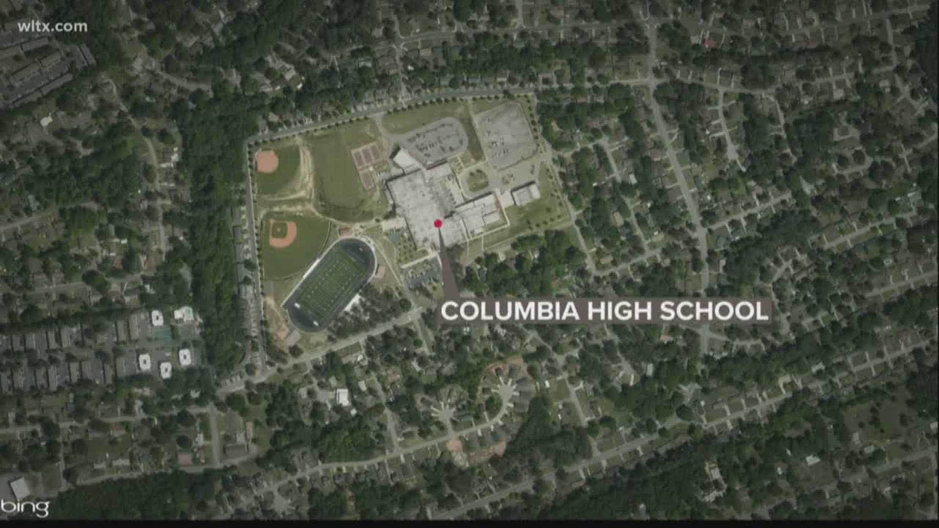 Two Columbia High School students have been arrested after they brought a loaded gun on the school's campus.
