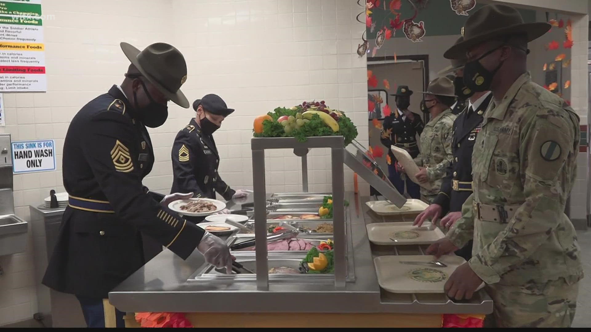 The soldiers in training were served by their superior officers.