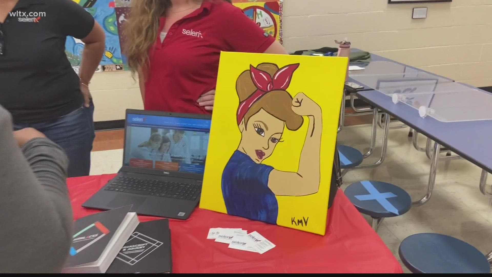 The district hosted the event to help educate students on the strength of women.