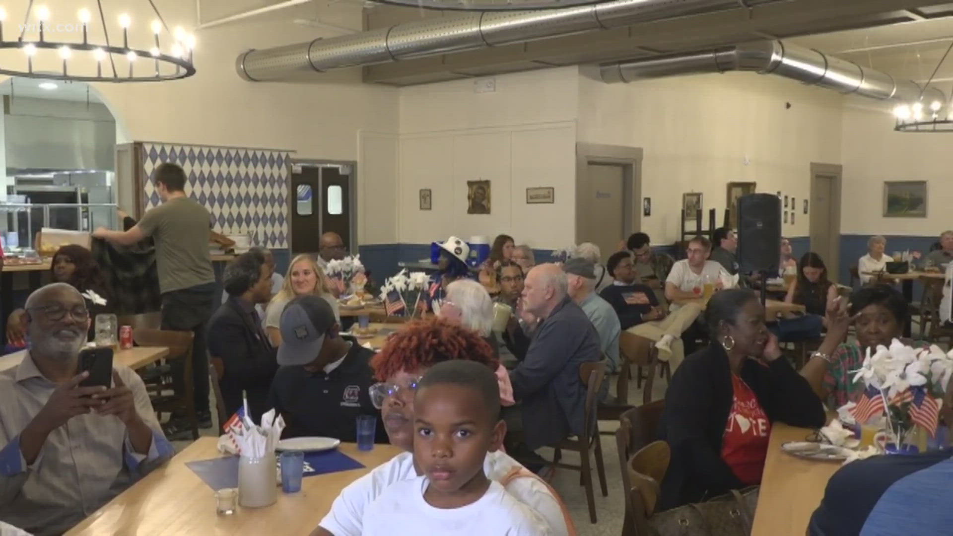 Democrats and Republicans gather to watch results from the Presidential election.