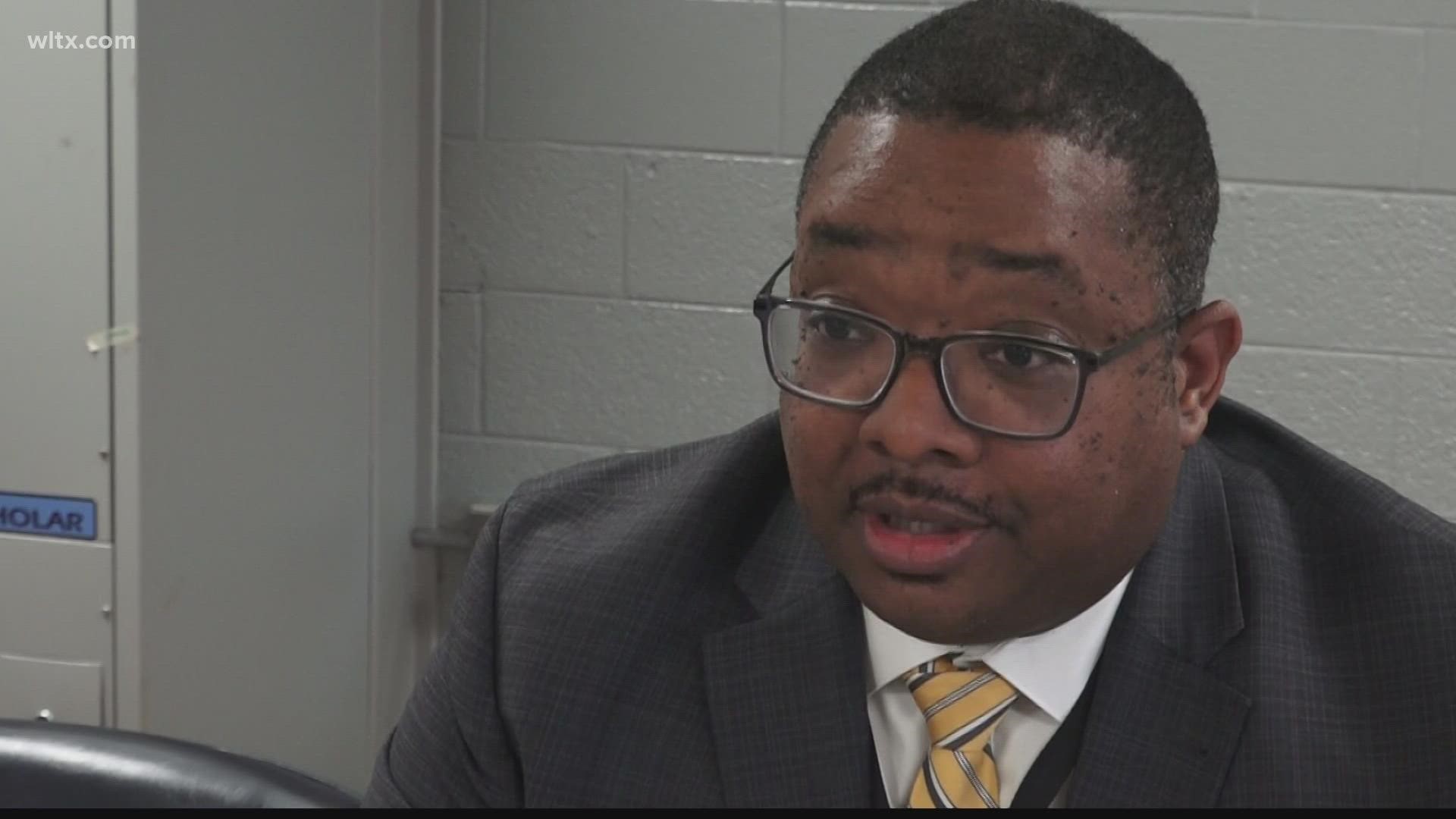 Dr. William Wright took his newly assigned seat as superintendent of Sumter County Schools on Monday.