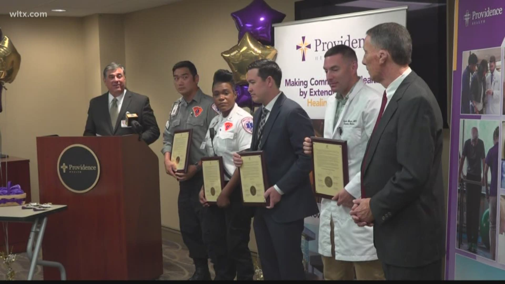 Emergency technicians honored at Providence Health.