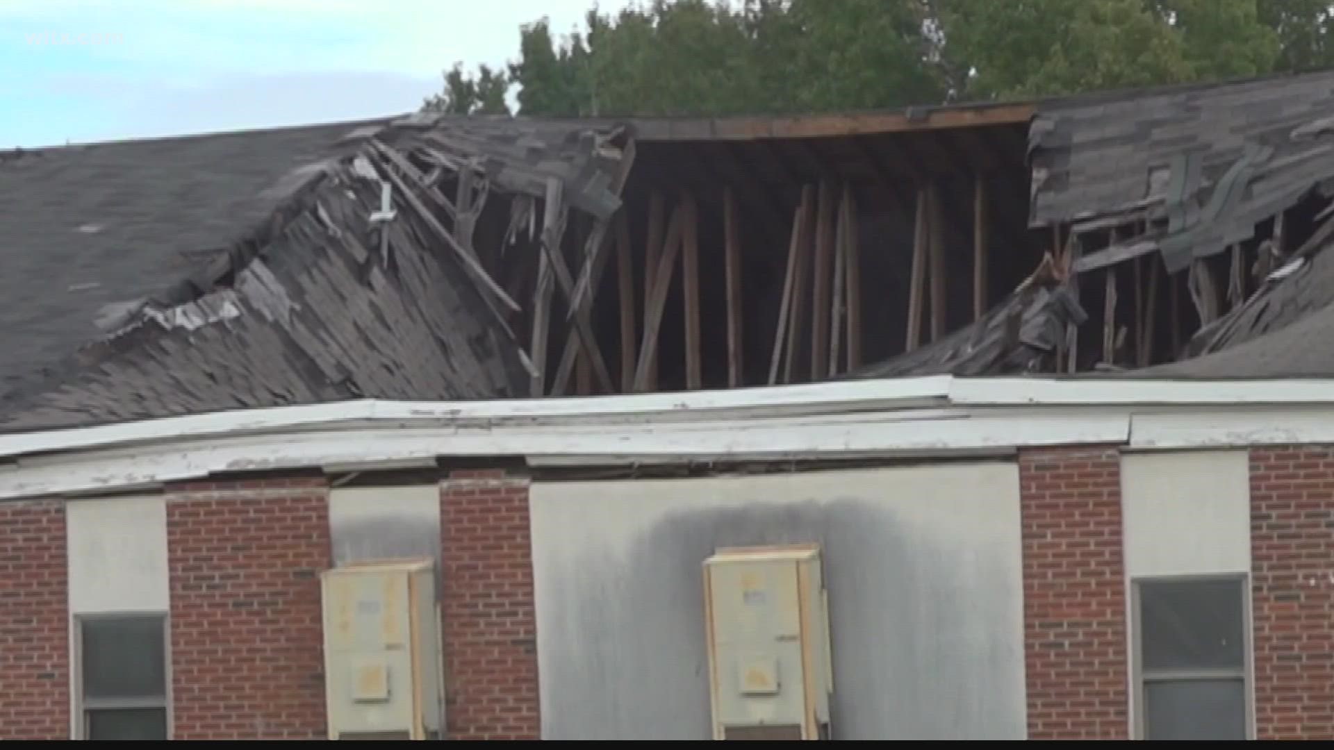 Plans were announced Thursday to remove a gaping hole in the roof of a Lee County school that raised safety concerns for some parents and community members.