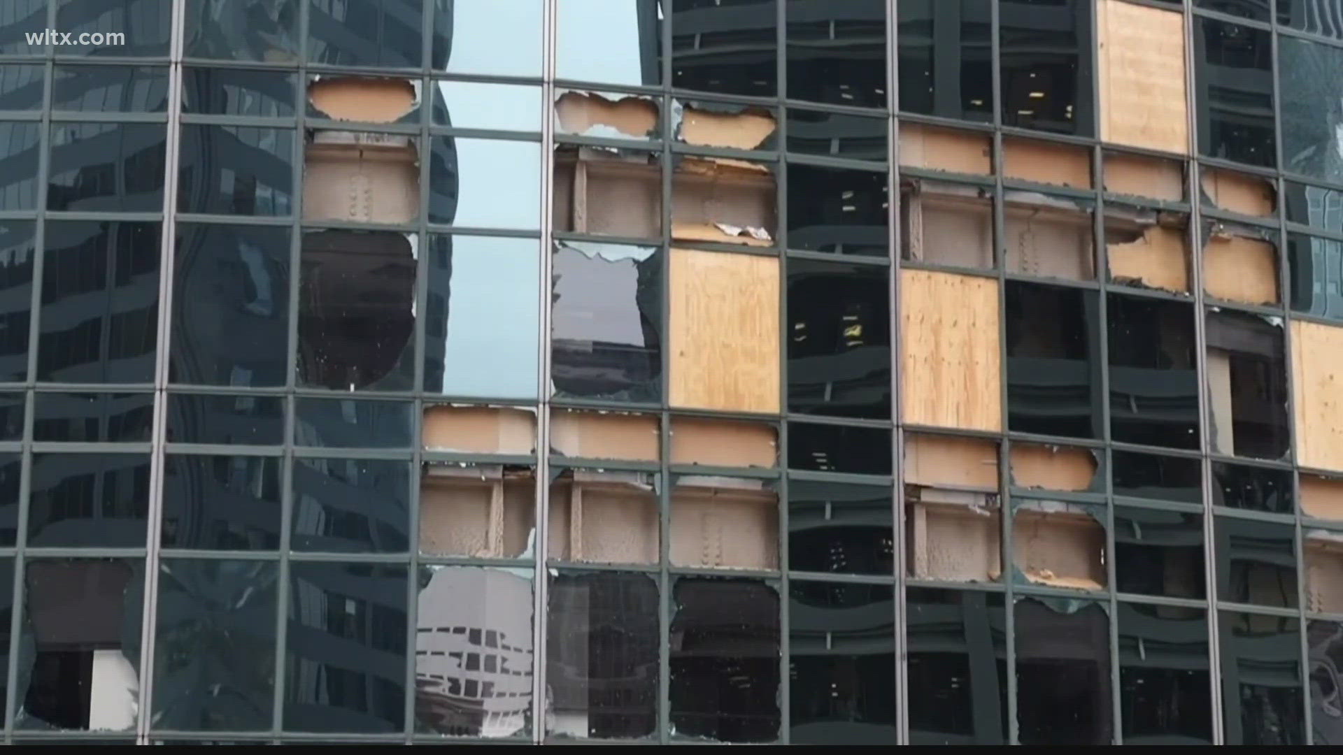 Hundreds of windows were shattered at downtown hotels and office buildings, with glass littering the streets below.