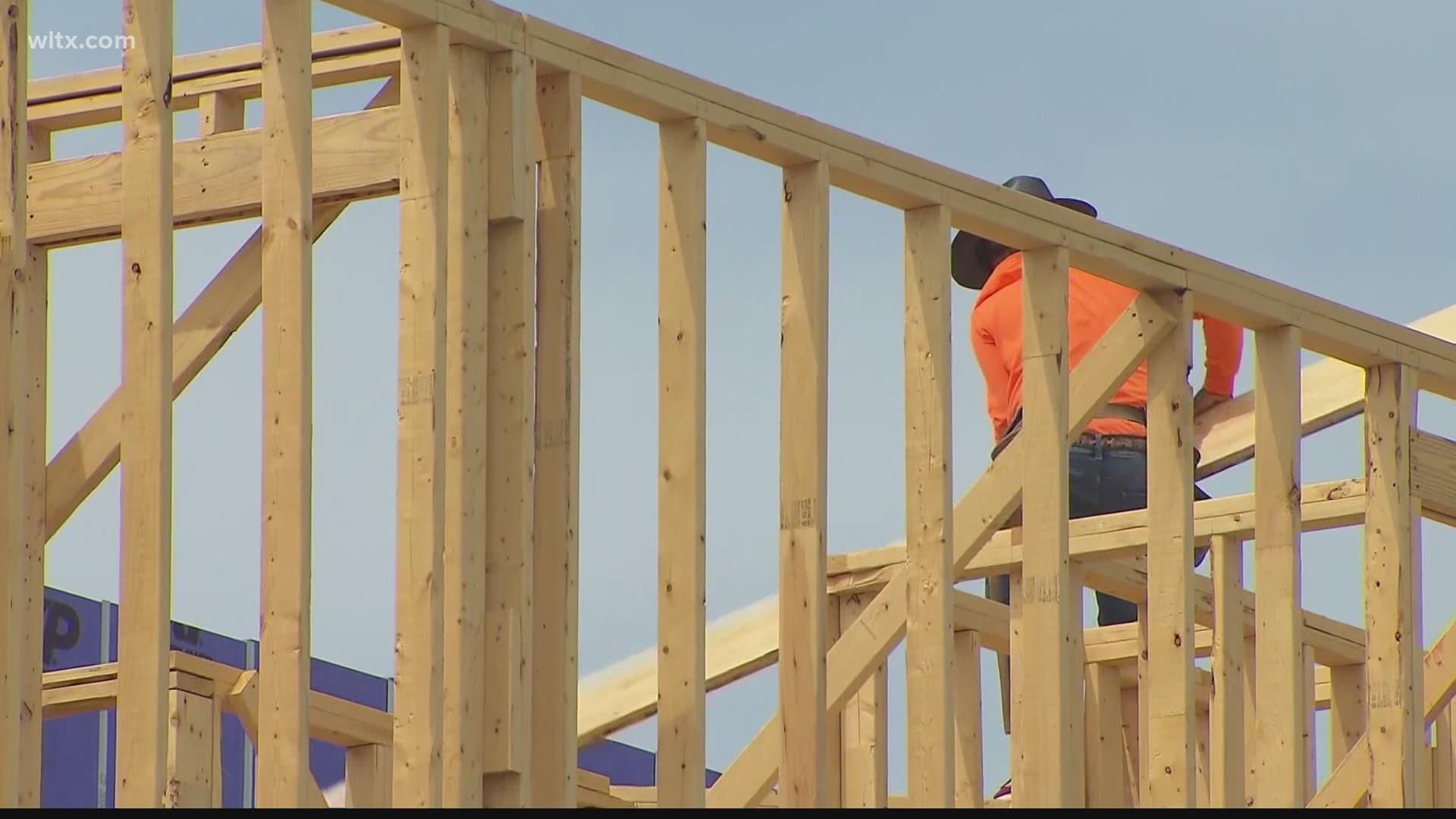 Record high lumber prices are driving up costs for builders and home buyers.