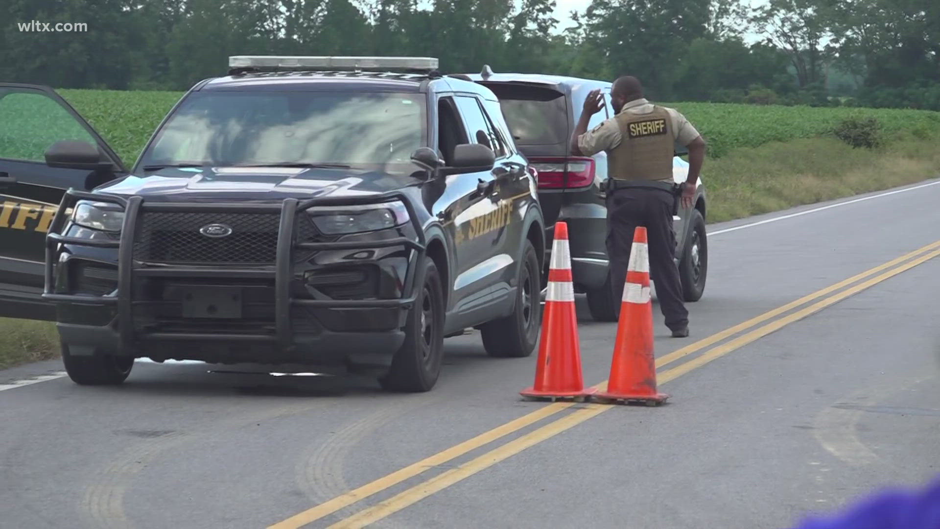 Authorities say two law enforcement officers are wounded, and a K-9 is dead after a search for a suspect ended in gunfire on Friday.