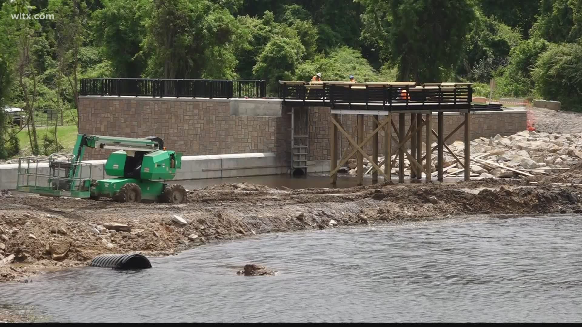 Town officials expect construction of the bridge to be completed by the end of May. They'll continue to work on rebuilding a fishing dock and picnic shelters.
