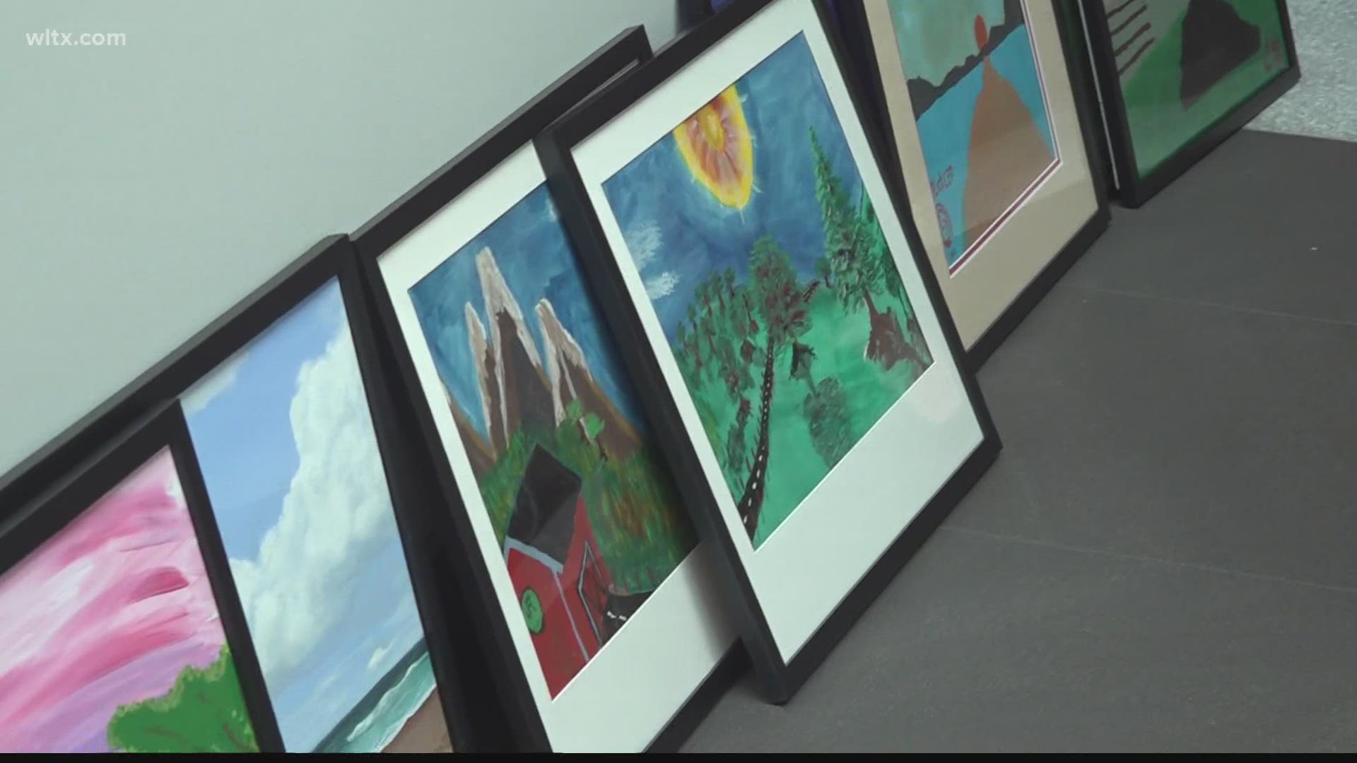 Transitions clients made artwork that is being displayed at the Columbia Metropolitan Airport.