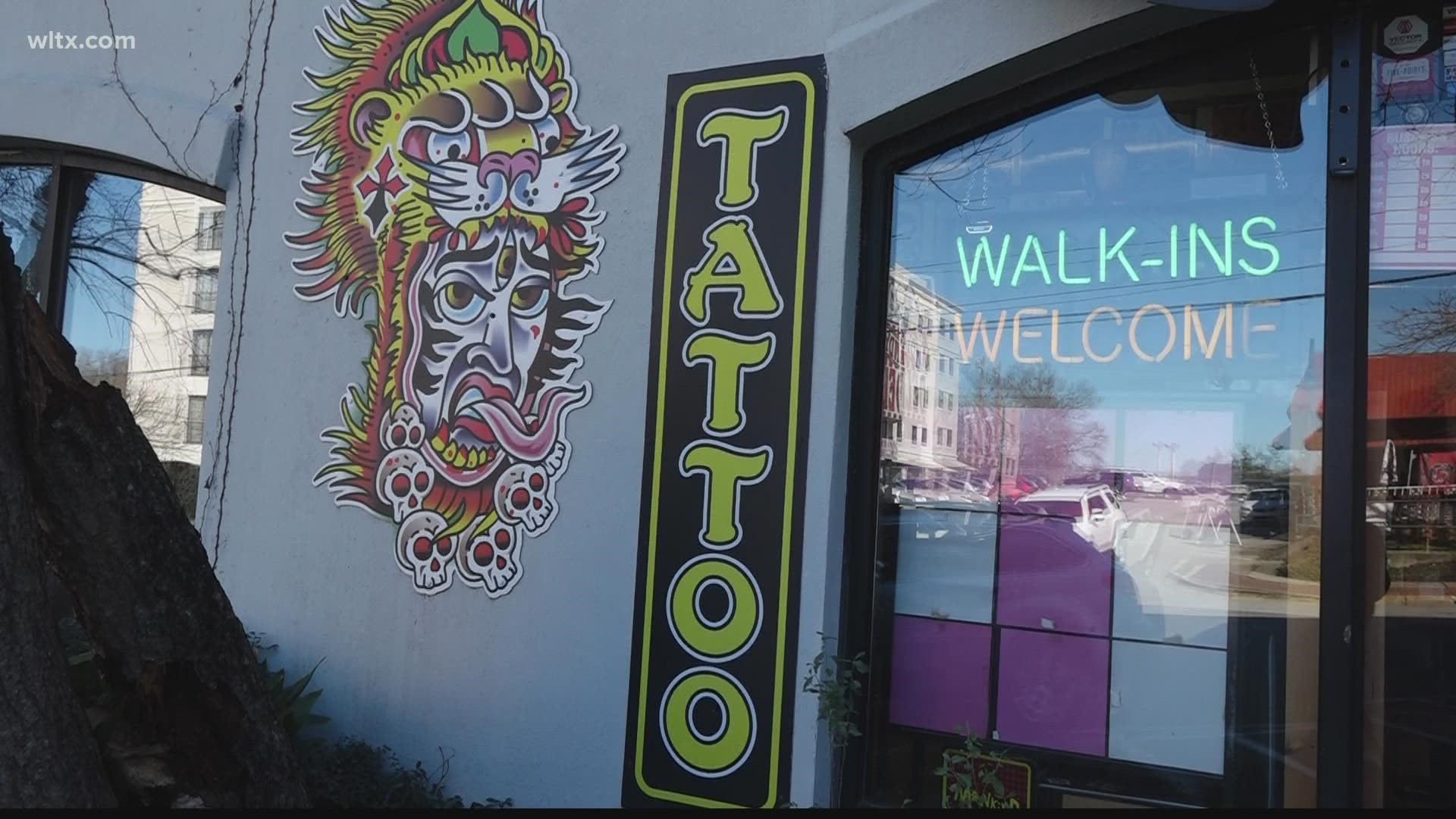Tatoo shops have to be located 100 feet from a residential zoning district and also 1000 feet from any other tattoo shop and that includes body piercings too.